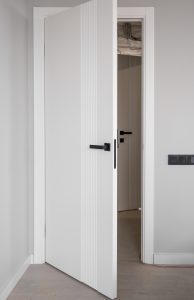 Bathroom doorway widened to 34 in. with an easy-use lever handle for better access.