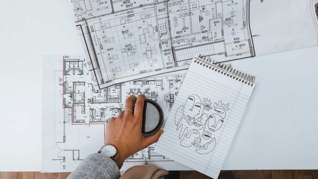home renovation permits Ontario — contractor reviewing blueprints and building permit documents. ome renovation permits Ontario