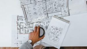home renovation permits Ontario — contractor reviewing blueprints and building permit documents. ome renovation permits Ontario