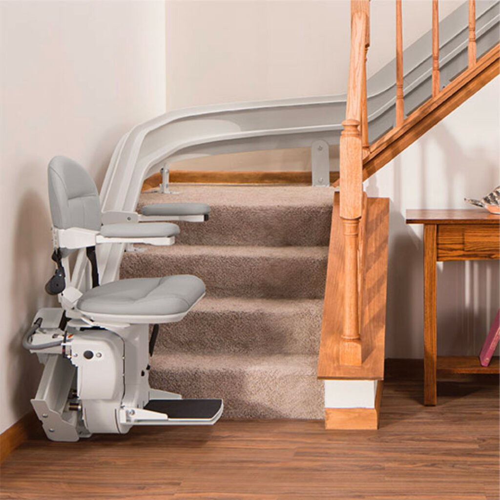 stair lift installation cost Ontario — curved rail stair lift on staircase